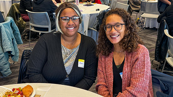 two women smiling